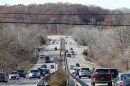 Cars travel along Route 441 in Penfield, looking west toward the Panorama Trail on- and off-ramps. Penfield has taken over jurisdiction of traffic tickets from the state.