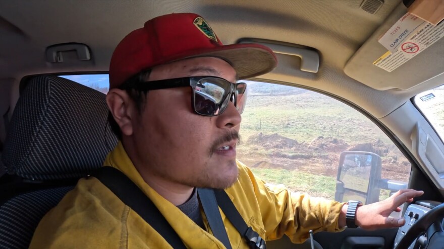 DLNR forester Chris Chow patrols the upcountry area for fire flare-ups.