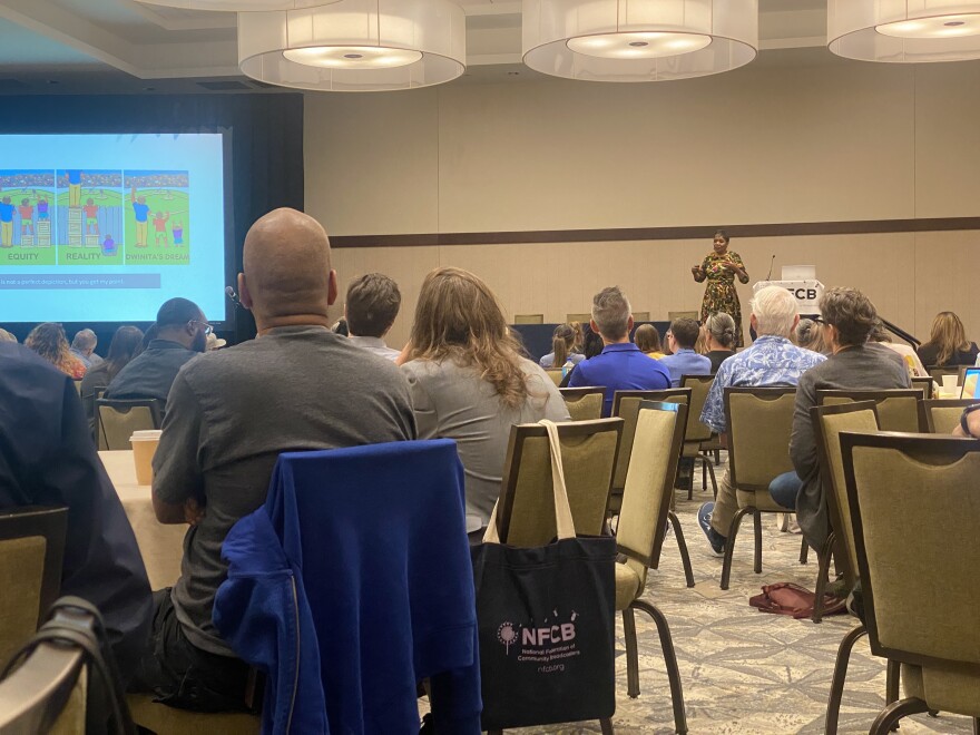 Dr. Dwinita Mosby Tyler discusses equity in public media with a room full of community broadcasters from around the country, including KVNF.