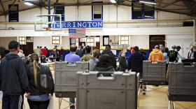 At the Armory in Torrington, a tabulator ceased functioning. Polling place moderator Garrett Waldron speculated that it was a mechanical failure. A second tabulator was immediately brought in and setup. "It was no different from 5:45 when I do it in the morning, just a different time of day for me," Waldron said. A line of voters with completed ballots in hand began to snake through the room as this setup process took place. All in all the tabulator was only down for about five minutes, and the line disappeared in another five. Despite the tabulator being down voting was never actually suspended. All voters waiting in line had the option to place their ballots in the tabulator's auxiliary slot to be hand counted later. However, almost all voters decided to wait for the machine count to resume.