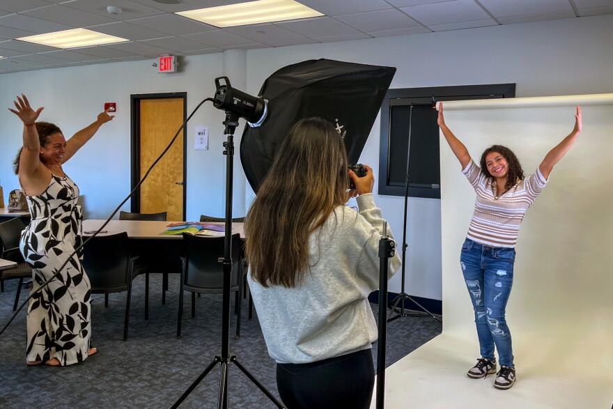 Rebeca Carrasquillo (left) is helping her mentee Esmeraida Figueroa (right) with her poses for a photoshoot with Big Brothers Big Sisters of Connecticut on September 19, 2026. The pair were photographed for a feature in the organization's 2026 Annual Report.
