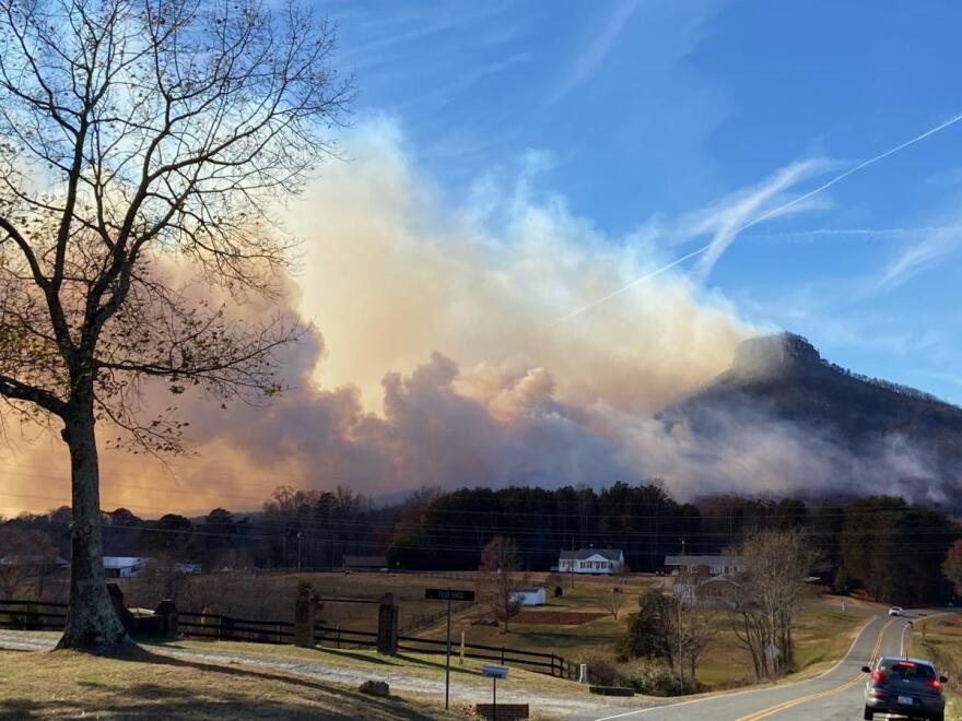 The forest fire at Pilot Mountain State Park emits thick smoke as captured by WFDD's Paul Garber.