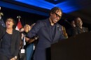 U.S. Rep. Wesley Bell, D-St. Louis County, laughs with supporters after defeating former U.S. Rep. Cori Bush in Missouri's Democratic primary during his election night watch party at the Marriott St. Louis Grand on Tuesday, Aug. 4, 2026, in downtown St. Louis.