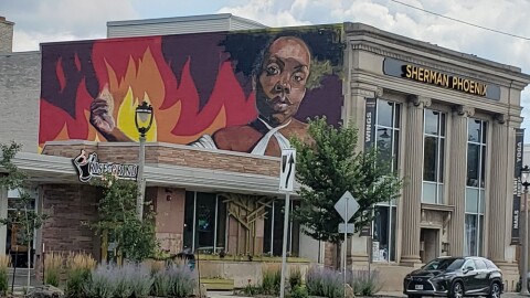 A mural created by Detroit artist Sydney James draws the eye of visitors.