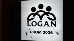 A sign reading “LOGAN Prom 2026” directs attendees to the event Sunday night in Elkhart.