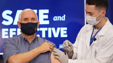 Vice President Pence receives the COVID-19 vaccine at the White House complex on Friday.