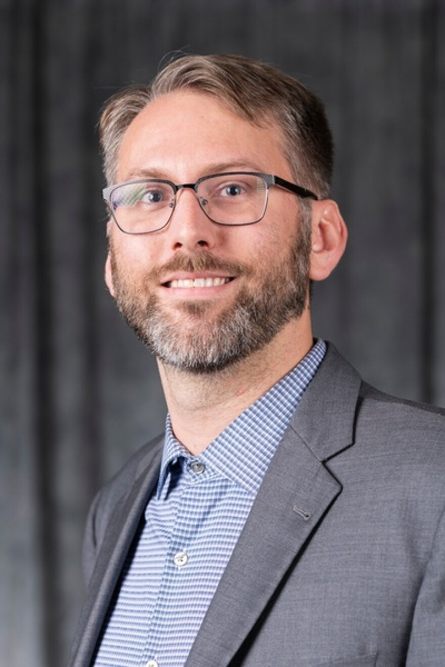 A.J. Simmons headshot