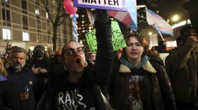 Protesters march during a rally demanding that NYU Langone commit to providing gender-affirming care for transgender youth following an executive order by President Donald Trump aimed at cutting federal funding, Monday, Feb. 3, 2025, in New York. (AP Photo/Heather Khalifa)