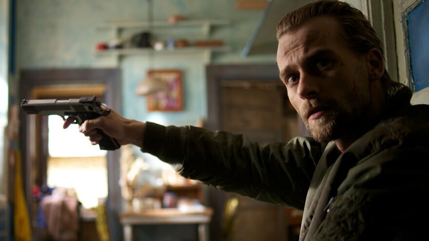 Joe Anderson plays Garrett Tully, a recently paroled white supremacist, in Deon Taylor's <em>Supremacy. </em>The film is based on the true story of Robert Scully, who was released from prison in 1995 and, days later, killed a police officer and took a black family hostage.