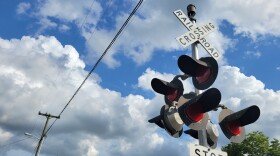 Image of railroad crossing at Queponco station in Newark, MD