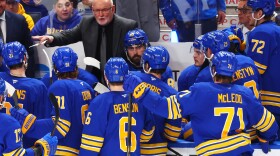 Buffalo Sabres head coach Lindy Ruff speaks with team during the third period in Game 1 of a second-round NHL hockey Stanley Cup playoff series against the Montreal Canadiens Wednesday, May 6, 2026, in Buffalo.