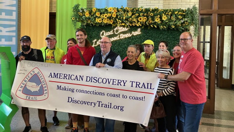 Participants and supporters of the America Discovery 250 Relay celebrated Wednesday morning, Oct. 7, at the Visit Quad Cities Destination Center at Davenport's Union Station.