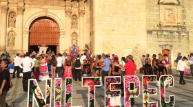 Crowds descend on the town square outside the historic<strong> </strong>Santo Domingo de Guzmán Catholic Church in Oaxaca City, the capital of Oaxaca, Mexico, for an annual festival to celebrate James the Apostle, patron saint of the town of Niltepec. Surrounding this bucolic scene was a different story: It was teacher's strike season – the bane of Oaxaca's restaurateurs.<strong></strong>