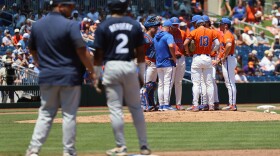 The UF baseball team strategizes during their game against Auburn University at Condron Family Ballpark in Gainesville, Fla., Saturday, April 18, 2026. (Delia Rose Sauer/WRUF)
