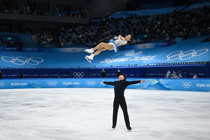 China's Sui Wenjing and Han Cong compete in the pair skating free skating on Feb. 19.