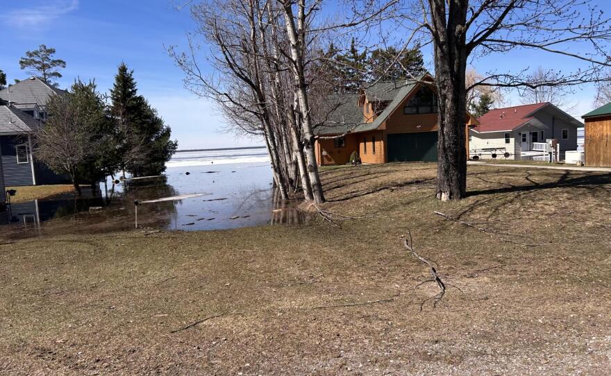 Floodwater creeps up lake shore in Cheyboygan County on Friday, April 17, 2026.