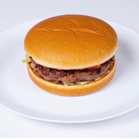 Hamburger on a white plate.