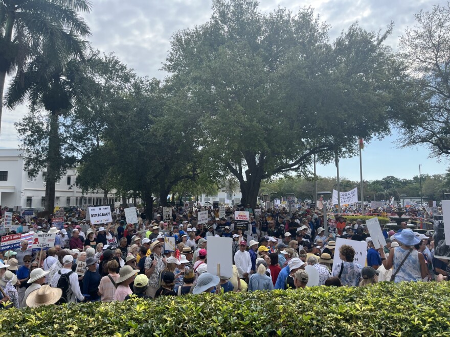 The largest crowd yet gathered for the No Kings III protest in front of the Collier County Courthouse. The crowd reached from the front of the courthouse to nearly the edge of the grass near the parking lot. People carried vivid signs expressing their displeasure with the Trump administration. More than any other No Kings demonstration, people seemed really fed up today.