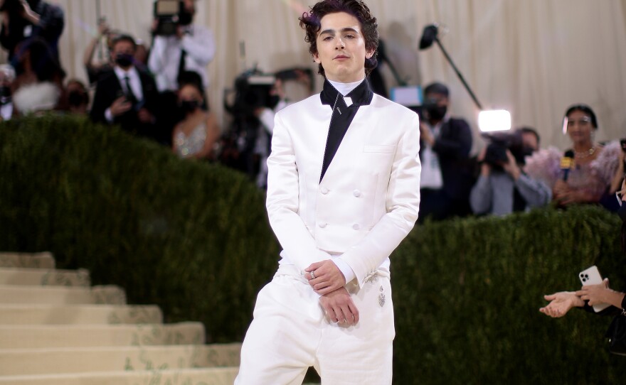 These Chucks were made for walking: Timothée Chalamet <a href="https://www.instagram.com/tchalamet/?hl=en">filmed himself on Instagram Live</a> hoofing it to the Met Gala, sporting an all-white Haider Ackermann suit and high-top Converse.