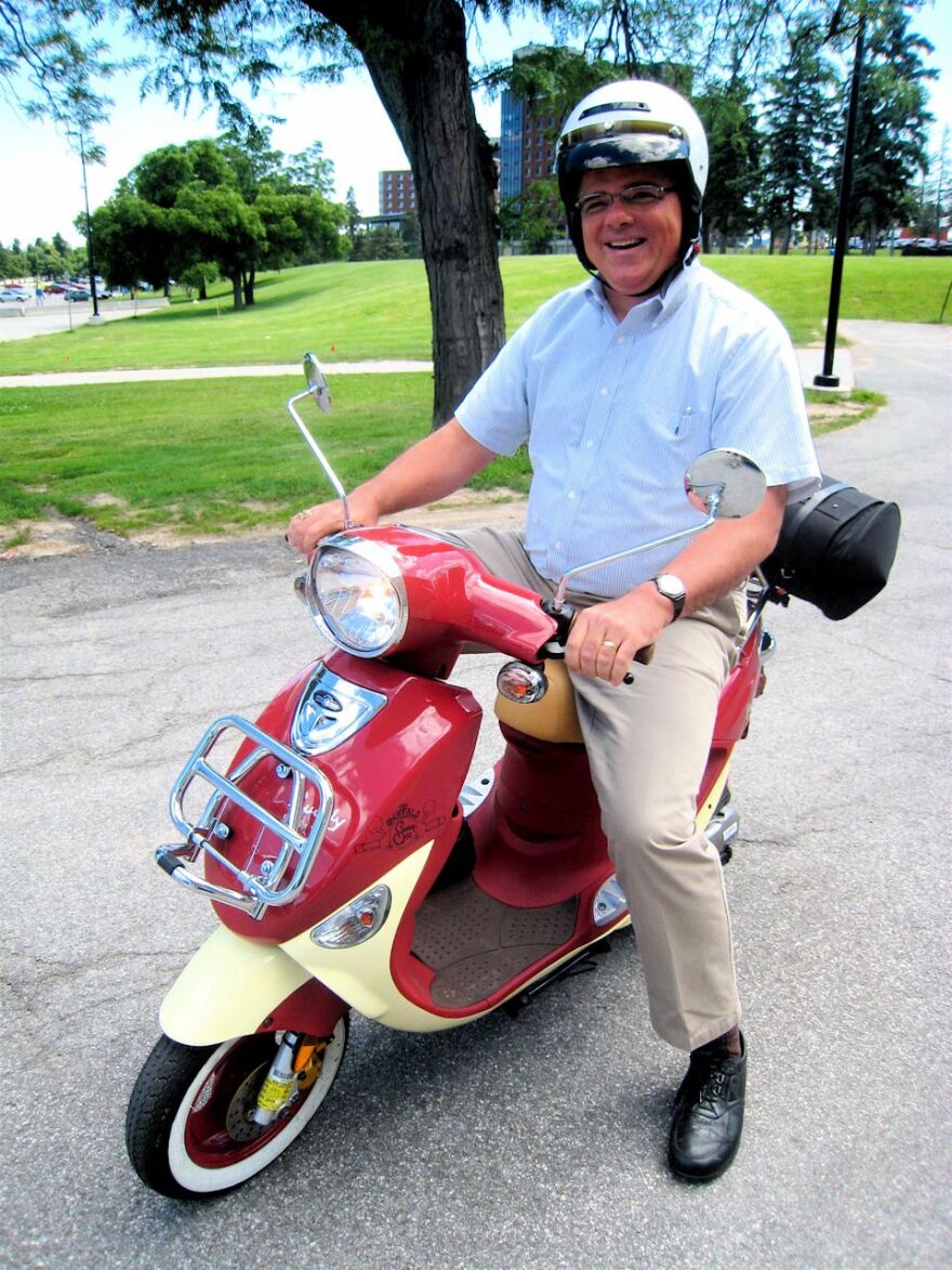 Mark Scott tries out Newell Nussbaumber's new scooter