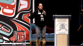 Joel Isaak, the Alaska Department of Education and Early Development’s tribal liaison, speaks about SB34 at the Elders and Youth Conference in Anchorage on Oct. 17, 2022. (Screenshot from First Alaskans Institute livestream.)