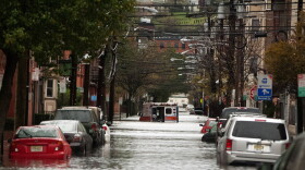 An ambulance sits abandoned in the middle of a flooded street after Hurricane Sandy Oct. 30, 2012 in Hoboken, New Jersey. (Michael Bocchieri/Getty Images)