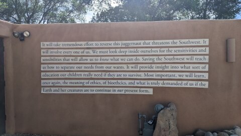 An excerpt of Jack Loeffler's writing is pasted on the exterior of H+H Arts. 