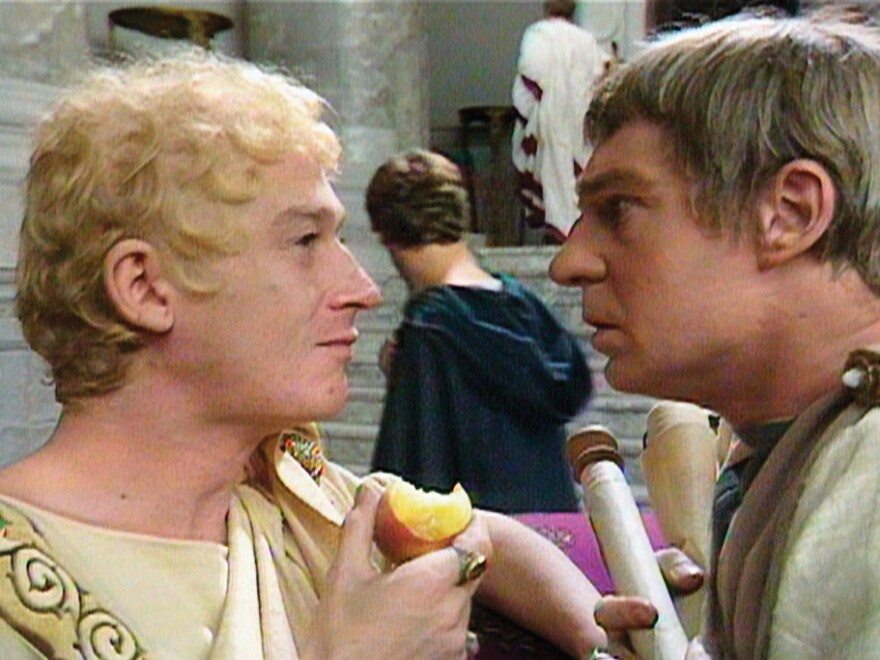 John Hurt (Caligula) and Derek Jacobi (Claudius) square off in the miniseries <em>I, Claudius.</em>