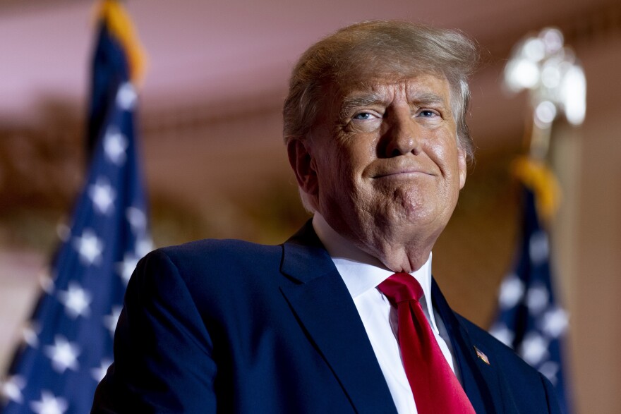 FILE - Former President Donald Trump announces he is running for president for the third time as he smiles while speaking at Mar-a-Lago in Palm Beach, Fla., Nov. 15, 2022. A lawyer for Trump said Thursday, March 30, 2023, that he has been told that the former president has been indicted in New York on charges involving payments made during the 2016 presidential campaign to silence claims of an extramarital sexual encounter. (AP Photo/Andrew Harnik, File)