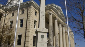 This statue honoring Confederate soldiers had stood in Greenville since 1914. Part of it was removed Monday by Pitt County.