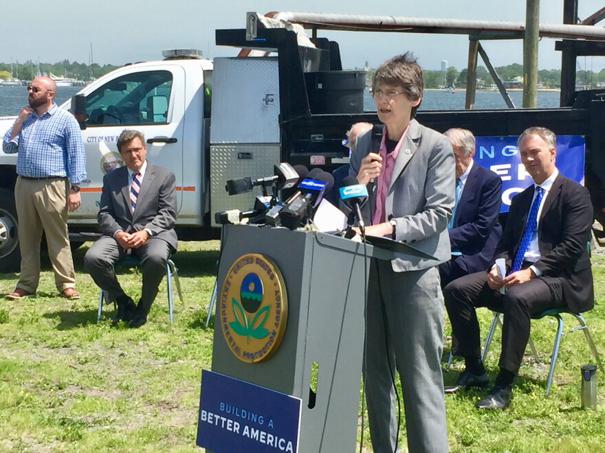 Janet McCabe, deputy administrator of the U.S Environmental Protection Agency, announces $72.7 million in federal funding to finish the New Bedford Harbor Superfund cleanup.