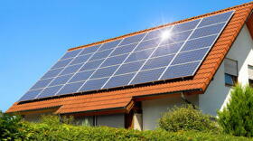Utility companies say if lots of people suddenly start using solar panels on their roofs, it would cause a huge disruption to the electric system.