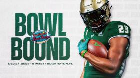 Football player holds a ball. To his left are the words "Bowl Bound Dec. 21, 2023 8 PM ET Boca Raton, FL"
