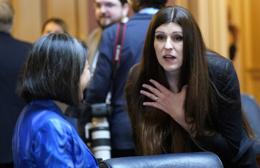 State Sen. Danica Roem, D-Prince William, right, speaks with Del. Cathy Tran, D-Fairfax, during the opening of the 2024 session of the Virginia General Assembly at the Capitol, Wednesday, Jan. 10, 2024, in Richmond, Va.