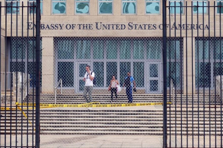 Workers at the U.S. Embassy in Havana leave the building in September 2017. New research out of the National Institutes of Health finds no unusual pattern of damage in the brains of Havana syndrome patients.