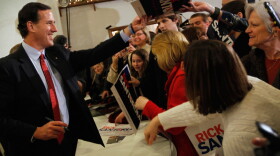Republican presidential candidate Rick Santorum greets people during a campaign stop  on Feb. 26, 2012 in Davison, Michigan. Michigan residents will go to the polls on Feb. 28 to vote for their choice in the Republican presidential race.