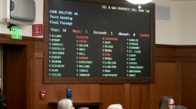 A board displays the vote on House Bill 381, cutting taxes for the Alaska LNG project, on Friday, June 12, 2026.