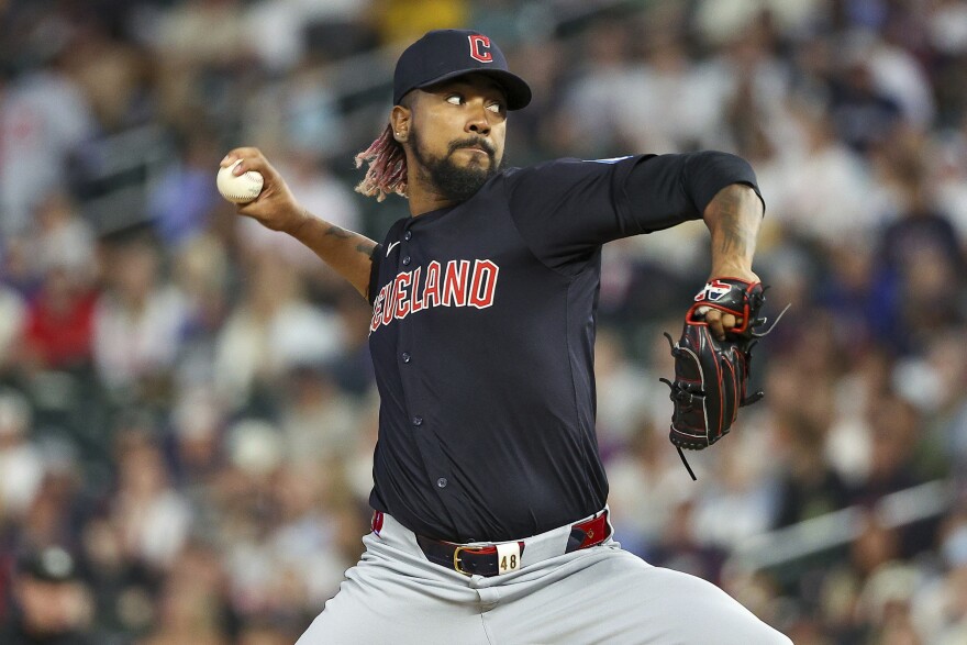Cleveland Guardians relief pitcher Emmanuel Clase delivers against the Minnesota Twins during the ninth inning of a baseball game, Saturday, Aug. 10, 2024, in Minneapolis.