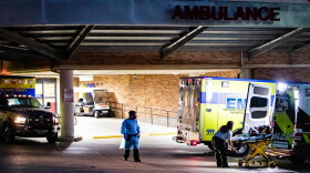 Healthcare workers outside of St. David's Medical Center in central Austin.