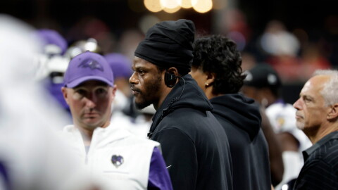 Injured Baltimore Ravens quarterback Lamar Jackson watches from the sideline during the first half of an NFL football game against the Atlanta Falcons, Sunday, Oct. 11, 2026, in Atlanta. (AP Photo/Erik S. Lesser)