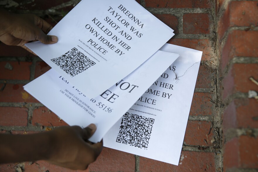 Amiri Nash's signs have QR codes with resources, including a link to donate to the Black Lives Matter movement.