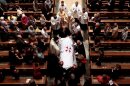 The casket of Phyllis Schlafly is escorted down the aisle of the Cathedral Basilicia of St. Louis following a funeral Mass on Sept. 10, 2016.