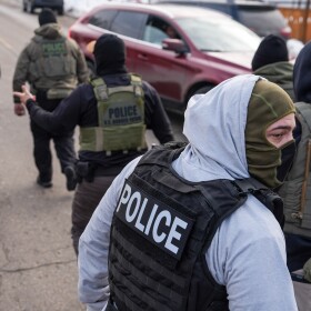 FILE - Federal agents conduct immigration enforcement operations Thursday, Feb. 5, 2026, in Minneapolis.