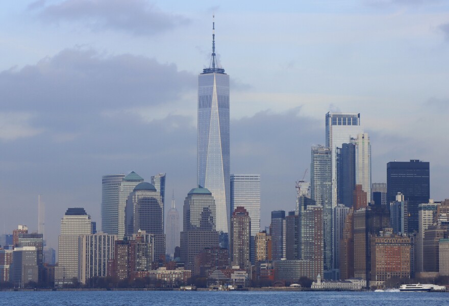 NEW YORK, NY - JANUARY 24: The Empire State building stands next to One World Trade Center seen from the New York harbor on January 24, 2022, in New York City. (Photo by Gary Hershorn/Getty Images)