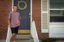 Jaxon Smith stands in front of his home in Sandy, Aug. 5, 2026.