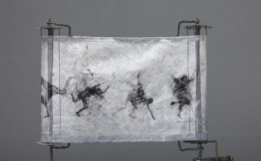 June Leaf’s, “White Scroll with Dancing Figures,’’ 2008, echoes the form of a Hebrew Torah scroll.