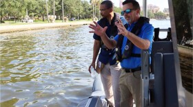 Eric Sutton and Shawn Hamilton on a boat in Tampa Bay