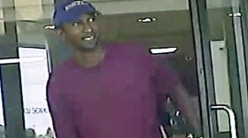Picture of suspect leaving the credit union.