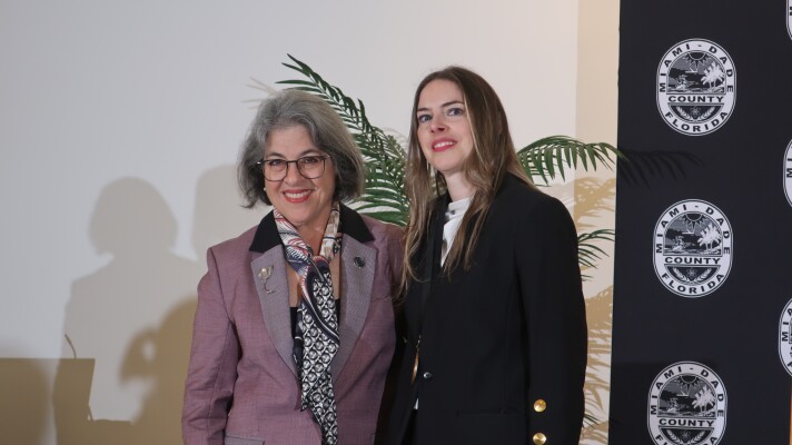 Nicole Tallman, right, was named as the new Miami-Dade Poet Laureate by county mayor Daniella Levine Cava