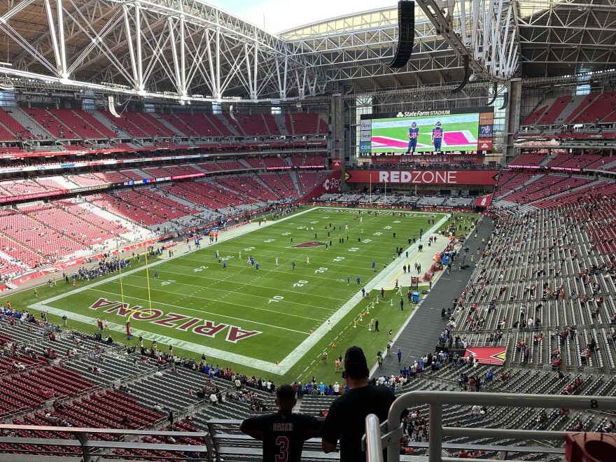 Fans file into State Farm Stadium in Glendale on Sunday, Nov. 26, 2023 for a game against the Los Angeles Rams.